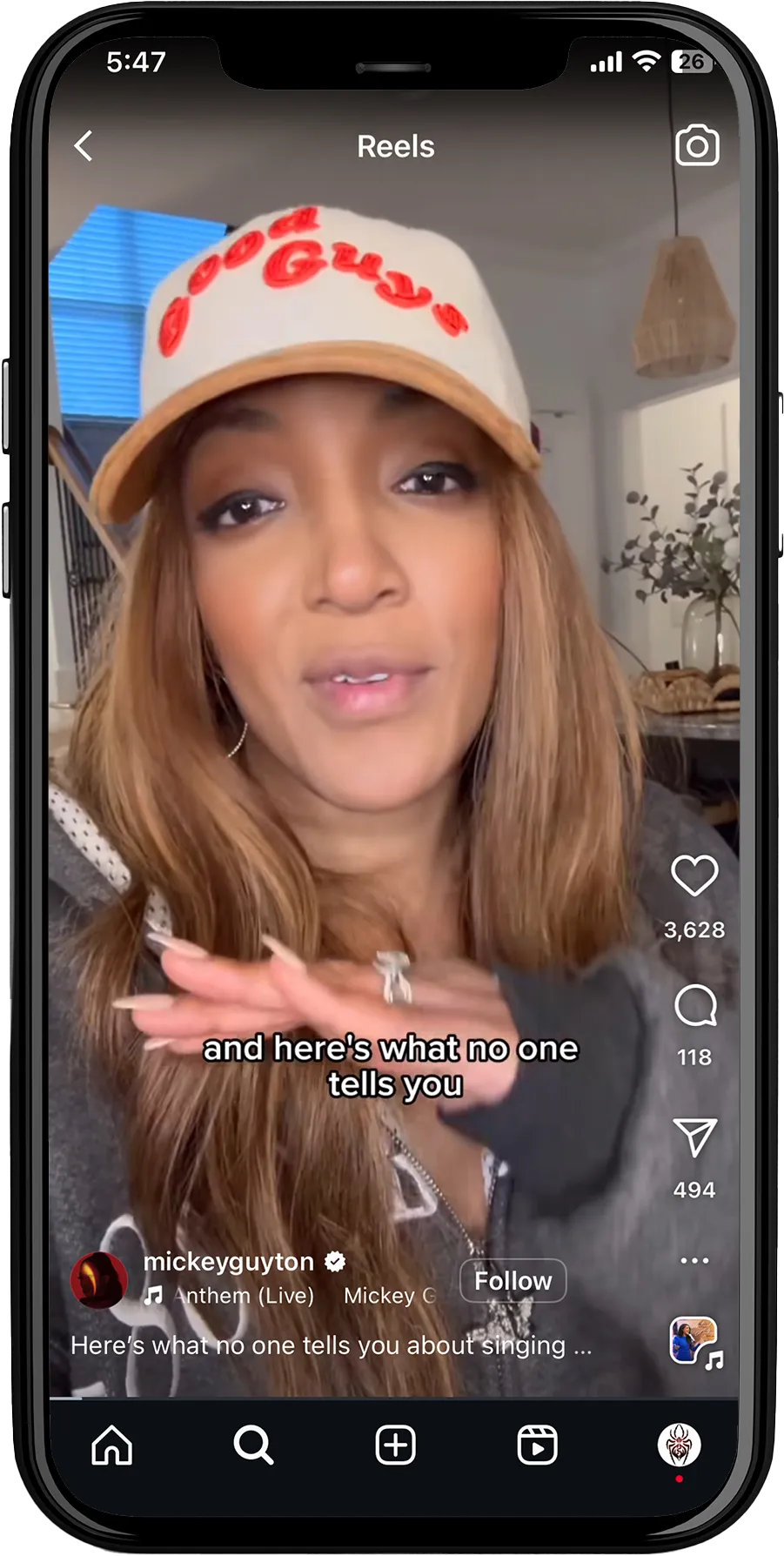 A social media Reels with a hook that reads: 'and here's what no one tells you.' The username 'mickeyguyton' appears below, along with a mention of a live performance by 'Mickey C.'