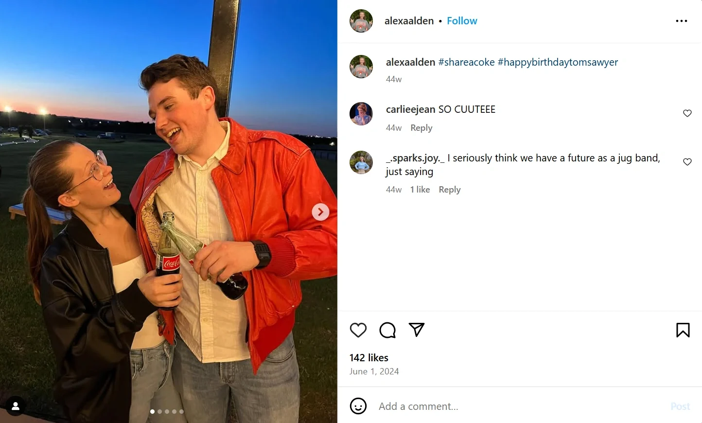 A couple laughing together while holding Coca-Cola bottles at sunset during a fun outing